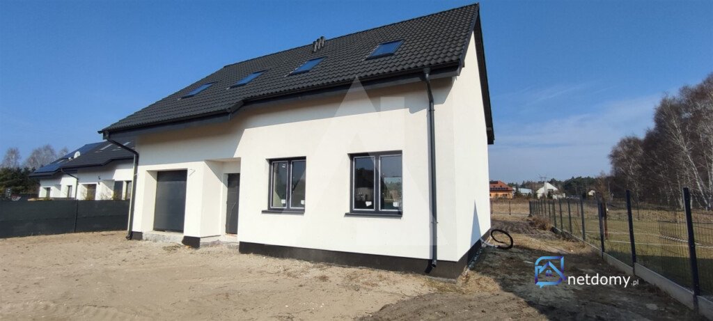 Nowoczesny dom wolnostojący z garażem i tarasem w Przyłękach, 150 m² - Netdomy