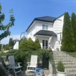 Przezmark k. Elbląga – rezydencja 222 m² z kortem tenisowym i garażem na 2 auta, działka 1 821 m² (2012 r.) - Netdomy