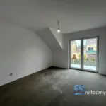 Nowoczesny dom w zabudowie bliźniaczej pod Warszawą 111,86 m2 – Łomianki - Netdomy