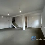 Nowoczesny dom w zabudowie bliźniaczej pod Warszawą 111,86 m2 – Łomianki - Netdomy