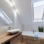 Elegancki segment 132 m² z ogrodem – Tarnów, komfort i bezpieczeństwo - Netdomy